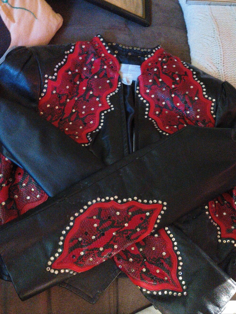 Studded Black Leather Jacket with Red Embroidered Accents